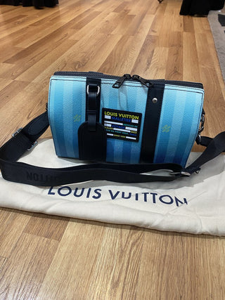 Louis Vuitton City Keepall like new, with bag & box