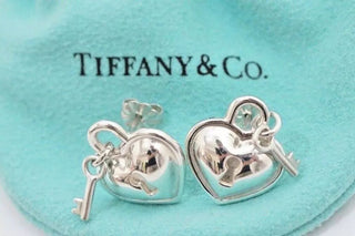 Tifffany & Co. stearling silver Heart Padlock pierced earrings
